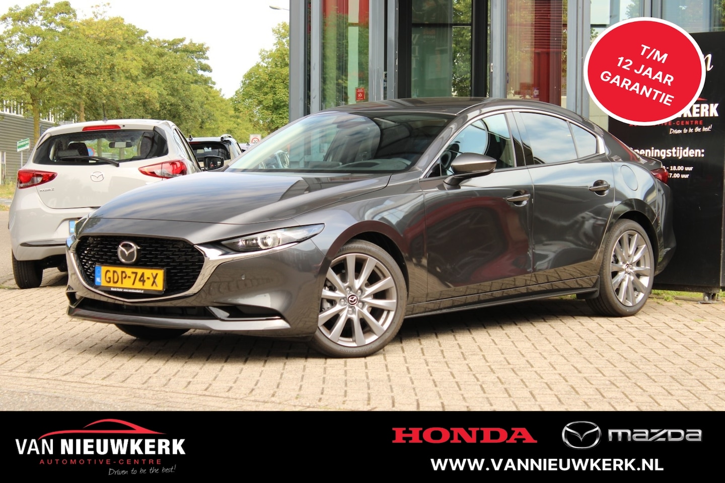 Mazda 3 - e-Skyactiv-G 150pk M Hybrid Exclusive-Line + Design Pack Draadloze Carplay Q Charger - AutoWereld.nl