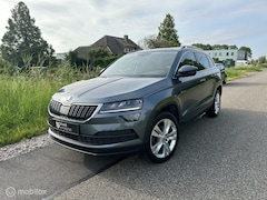 Skoda Karoq - 1.5 TSI DSG Business/ Elek Trekhaak / Navi / Cam