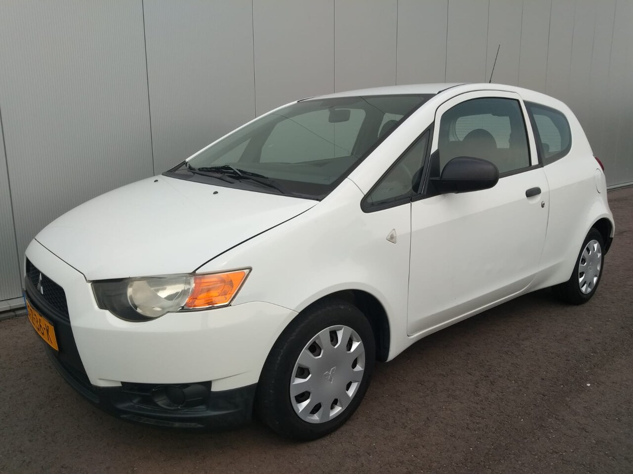 Mitsubishi Colt - 1.1 Inbusiness 1.1 Inbusiness - AutoWereld.nl