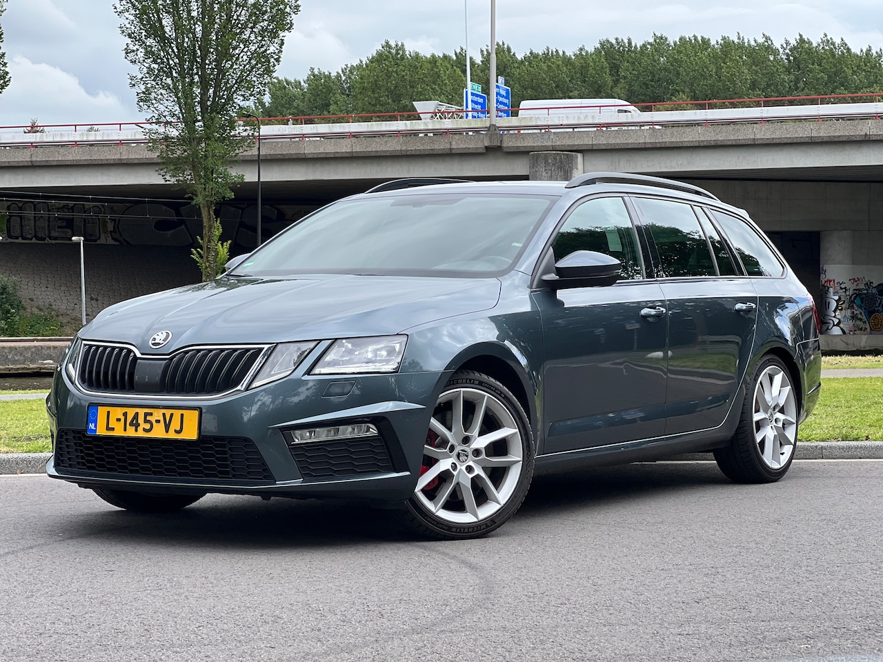 Skoda Octavia Combi - 2.0 TSI RS 230 Business - AutoWereld.nl