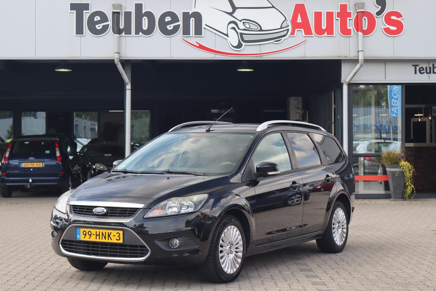 Ford Focus Wagon - 2.0 Titanium Navigatie, Climate control, Cruise control, Trekhaak - AutoWereld.nl