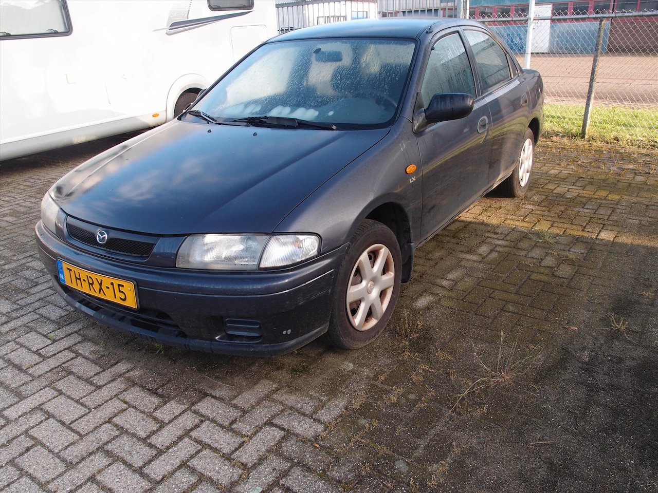 Mazda 323 - 1.5 i Lx - Extra Sedan Apk t.m. 07-2025. - AutoWereld.nl