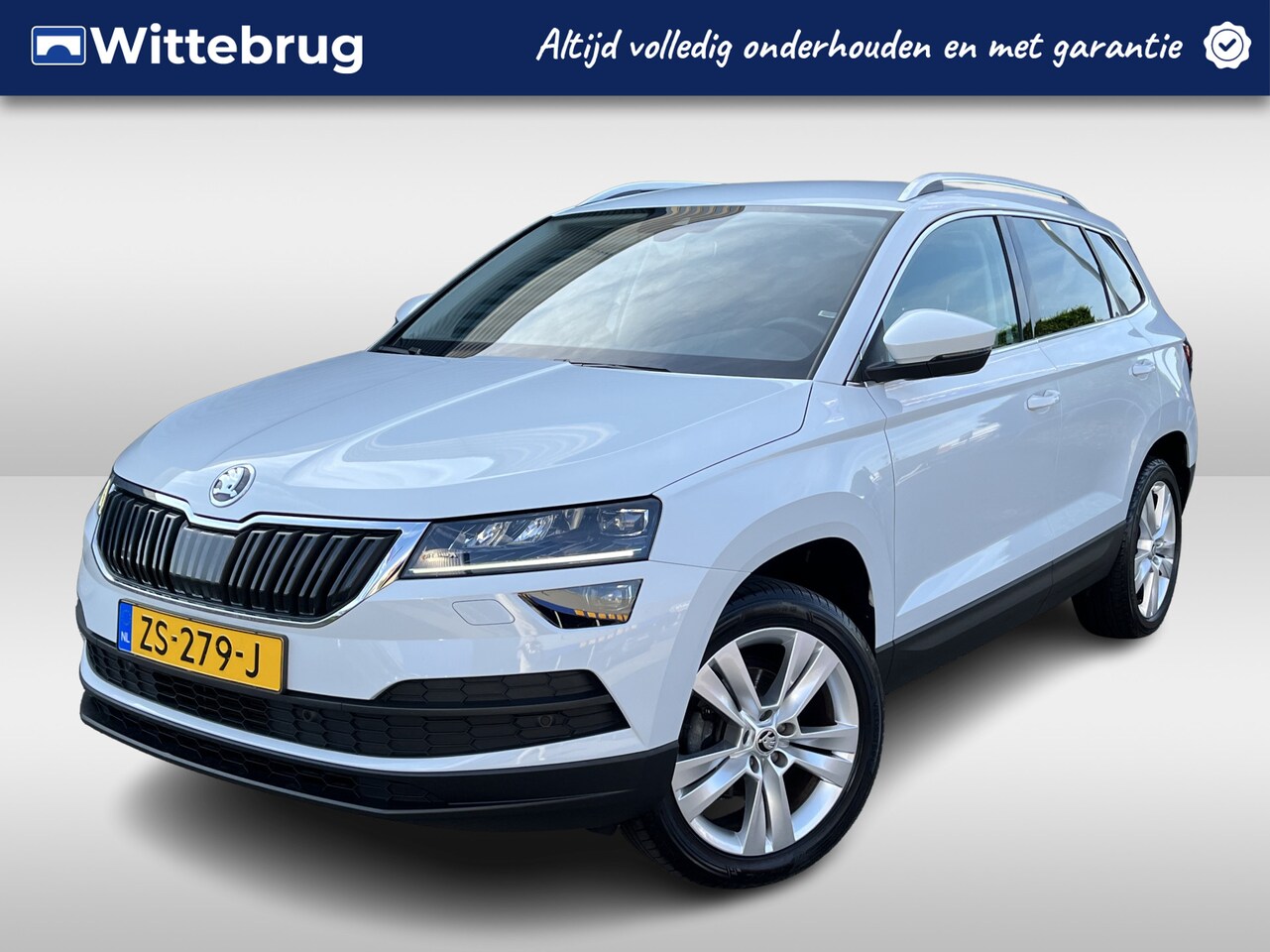 Skoda Karoq - 1.0 TSI Style Business Automaat | Navigatie | Virtual Cockpit | Stoelverwarming | Camera - AutoWereld.nl