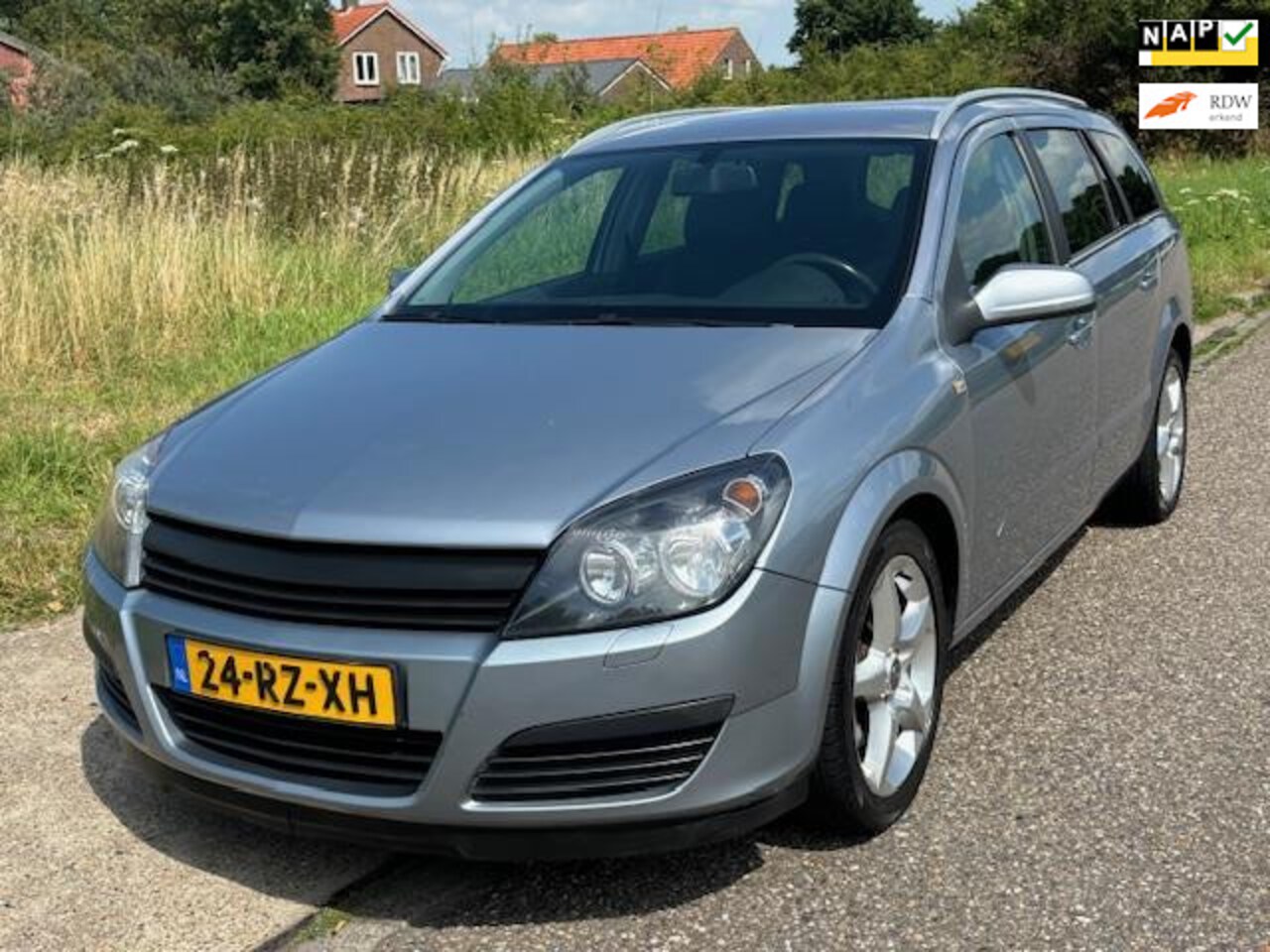 Opel Astra Wagon - 2.0 T Cosmo ECC Audio/CD Navi Leder/Stof El. pakket Sportstoelen ABS LMV 17" Cruisecontrol - AutoWereld.nl