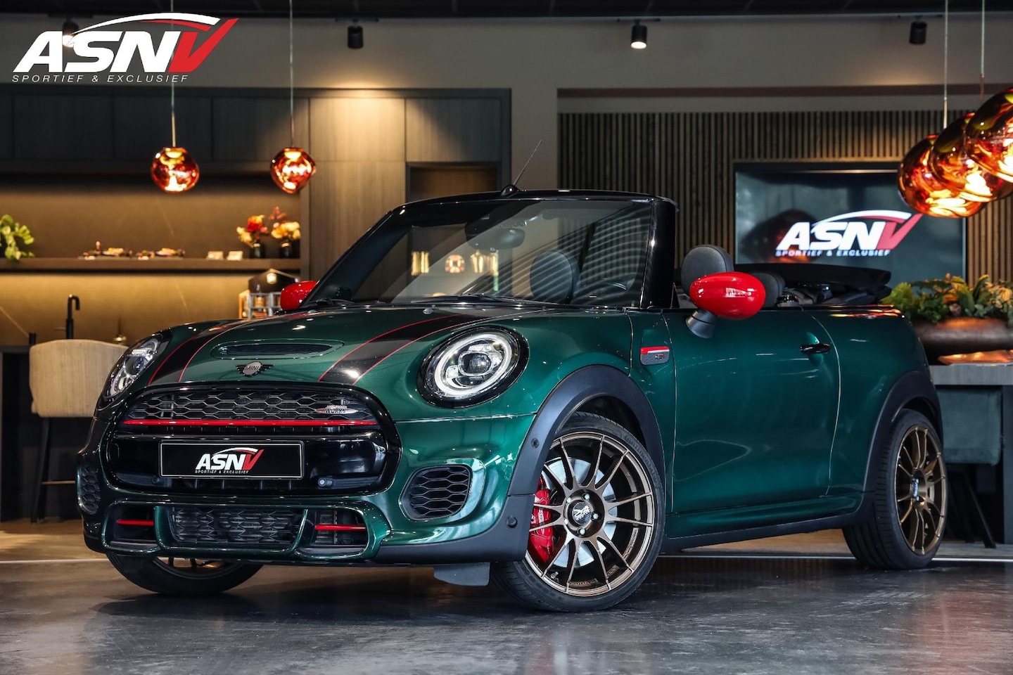 MINI Cabrio - 2.0 John Cooper Works Chili 2.0 John Cooper Works Chili, 231 PK, JCW/Exhaust, Adapt. Cruise/Control, Camera, 18''/OZ/W - AutoWereld.nl