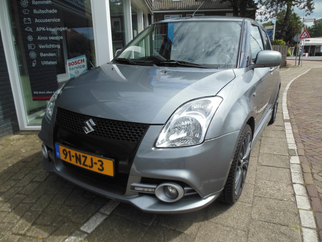 Suzuki Swift - 1.3 Comfort 12 maanden Bovag garantie - AutoWereld.nl