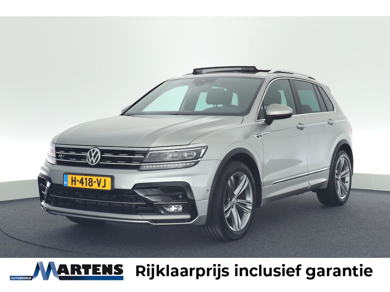 Volkswagen Tiguan - 1.5 TSI 150pk ACT DSG R-Line Highline Panoramadak Trekhaak Virtual Cockpit Camera Navigati - AutoWereld.nl