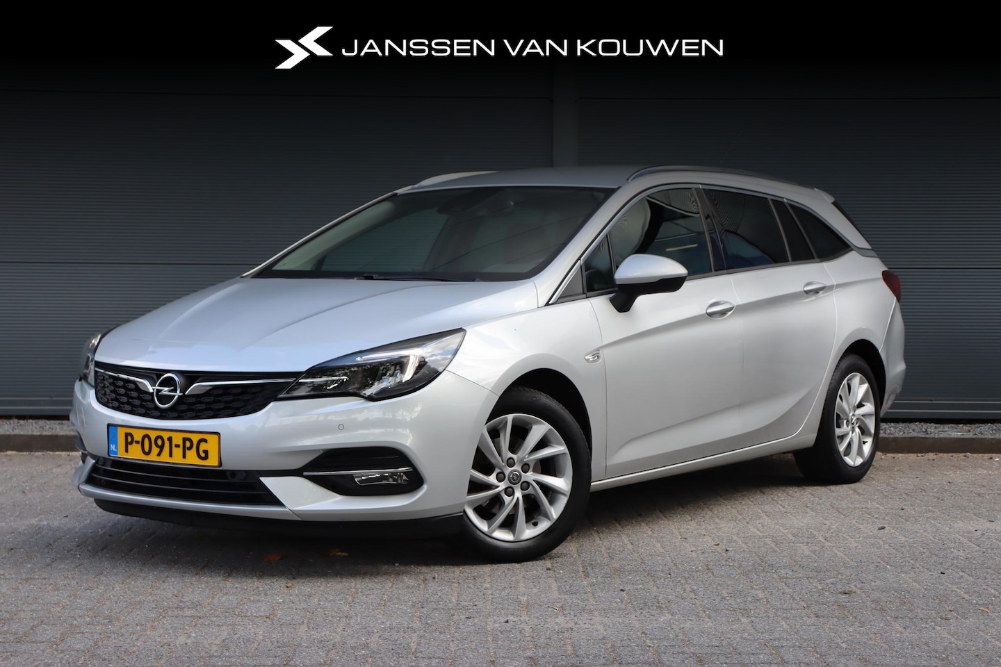 Opel Astra Sports Tourer - 1.4T 145PK Business Edition Aut. / Navi / Camera / Clima - AutoWereld.nl