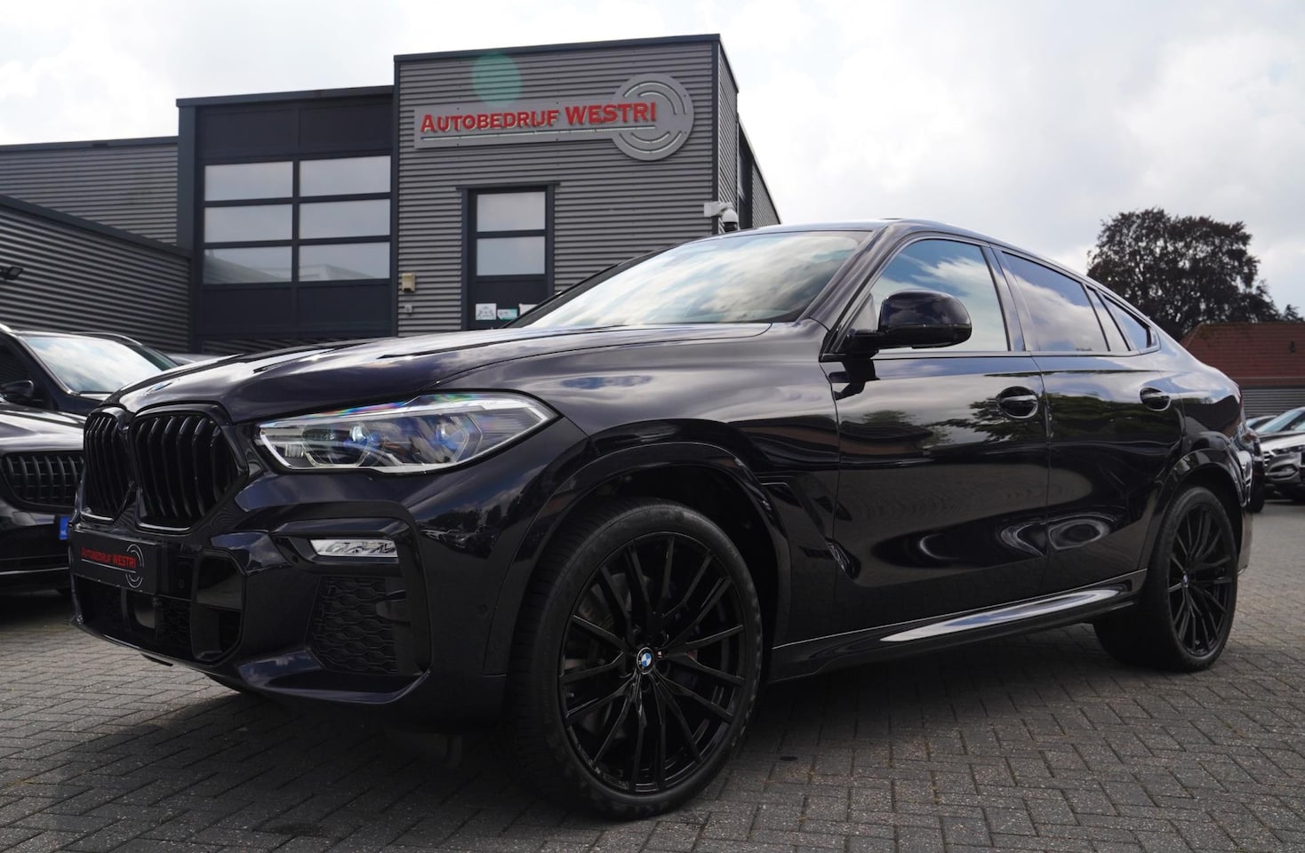 BMW X6 - XDrive40i High Executive | Panorama | 360cam | Carbon | Adaptieve cruise control | Kristal - AutoWereld.nl