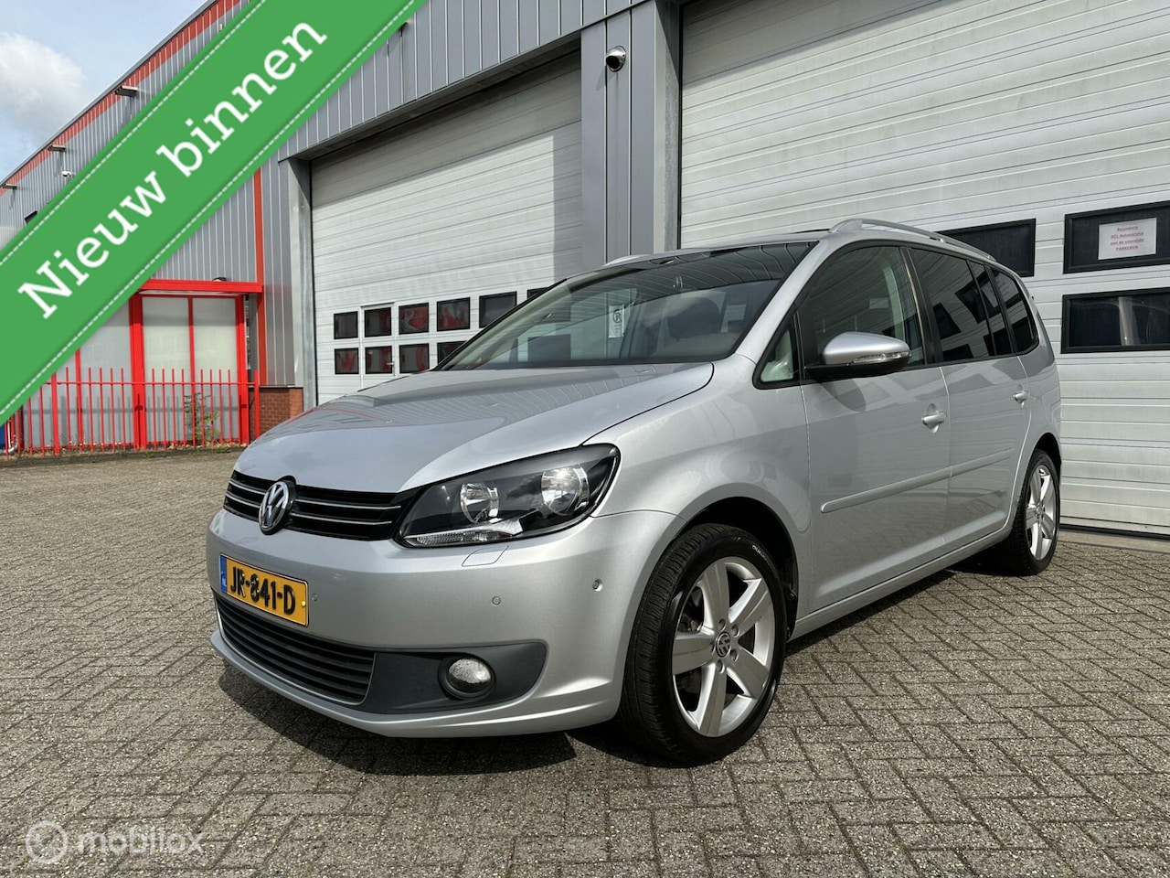 Volkswagen Touran - 1.6 TDI Highline BlueMotion 7p. 1.6 TDI Highline BlueMotion 7p/Pano/Navi - AutoWereld.nl