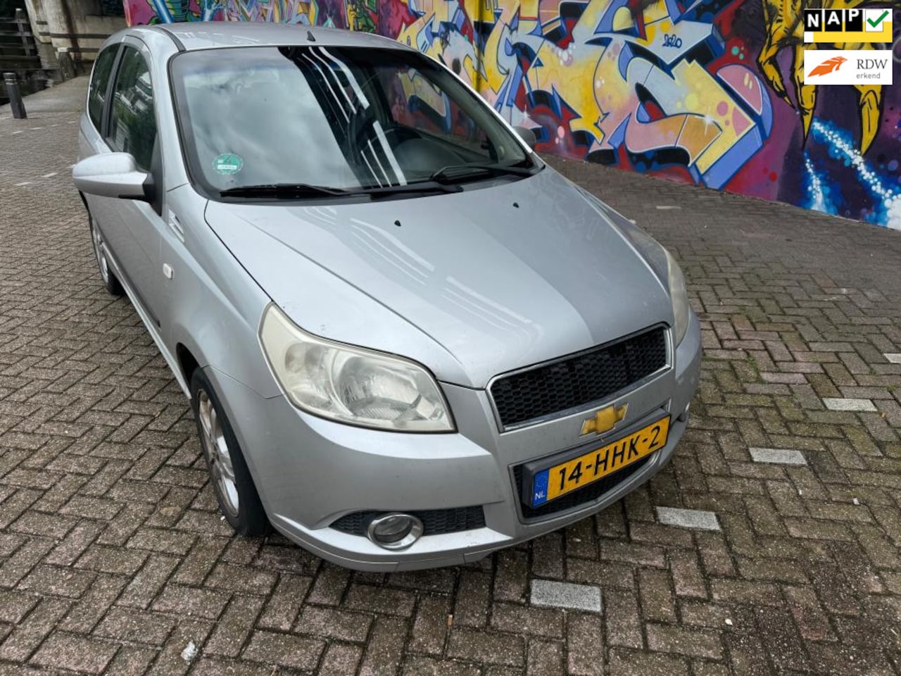 Chevrolet Aveo - 1.2 16V LS+ lage km n.a.p sport velgen airco elektrische ramen cv stereo - AutoWereld.nl