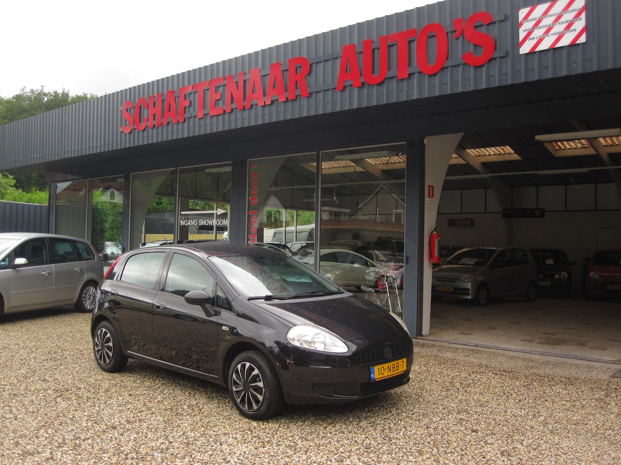 Fiat Grande Punto - 1.2 Actual 5drs met trekhaak km 95630 met nap pas - AutoWereld.nl