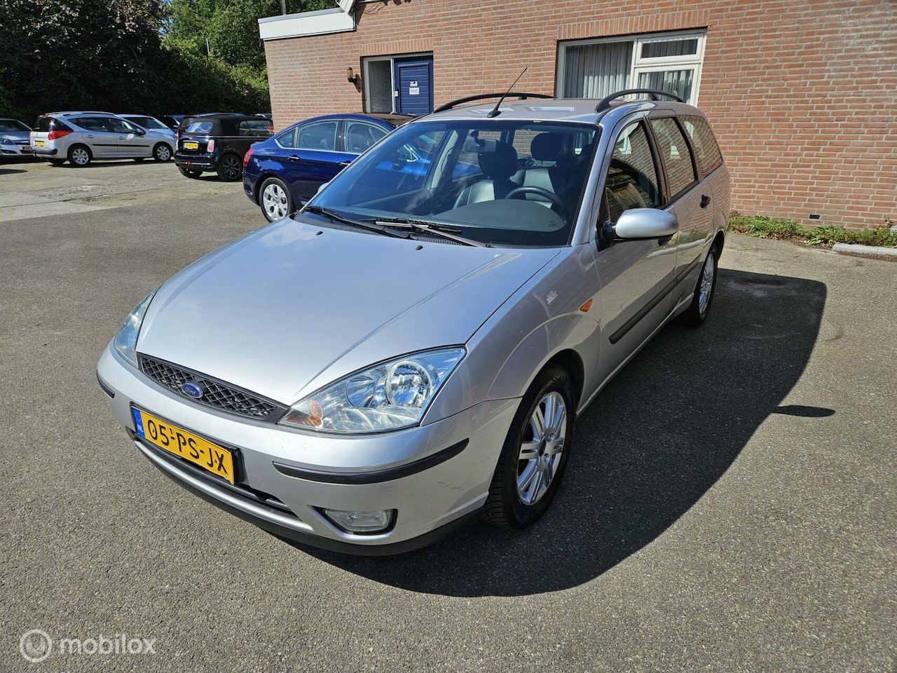 Ford Focus Wagon - 1.6-16V Ghia 1.6-16V Ghia - AutoWereld.nl