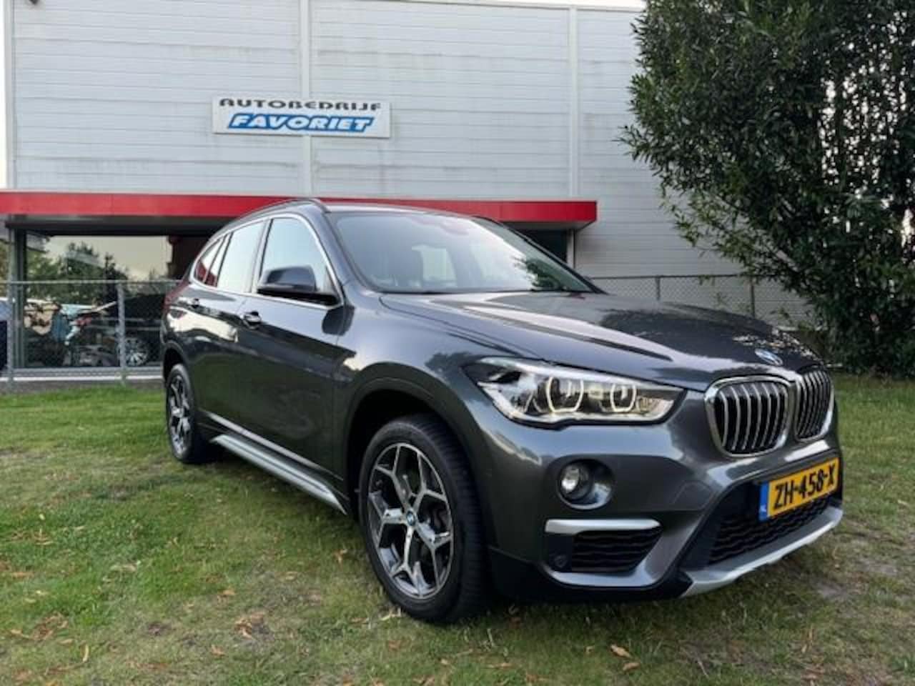 BMW X1 - SDRIVE 20I ORANE.EDITION.III /AUTOMAAT/HLEER/NAV/LED - AutoWereld.nl