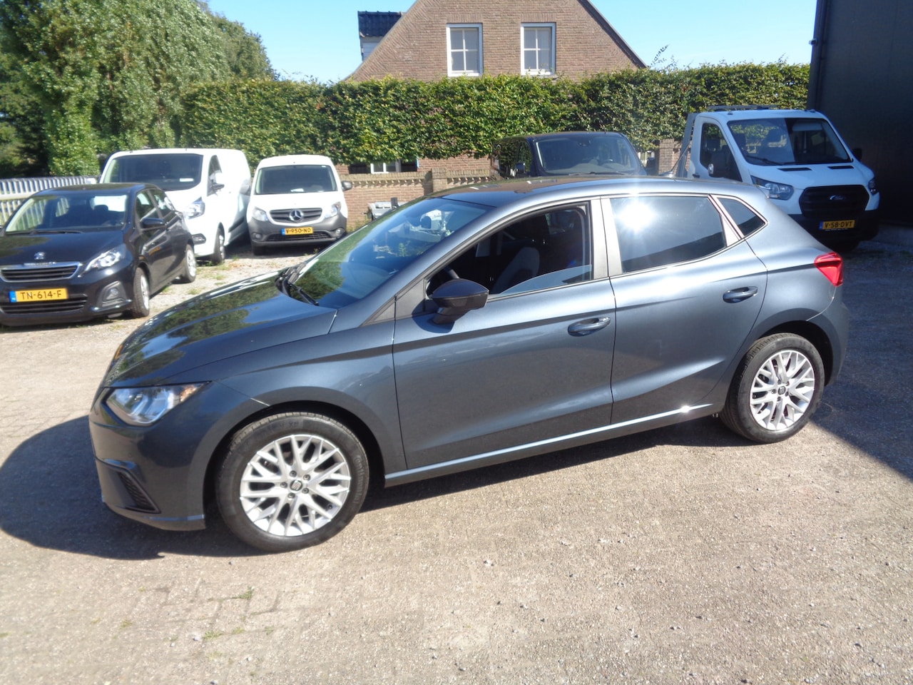 Seat Ibiza - 1.0 TSI Style Business Intense Ecc, PDC, Navigatie, Carplay, camera, LM velgern - AutoWereld.nl