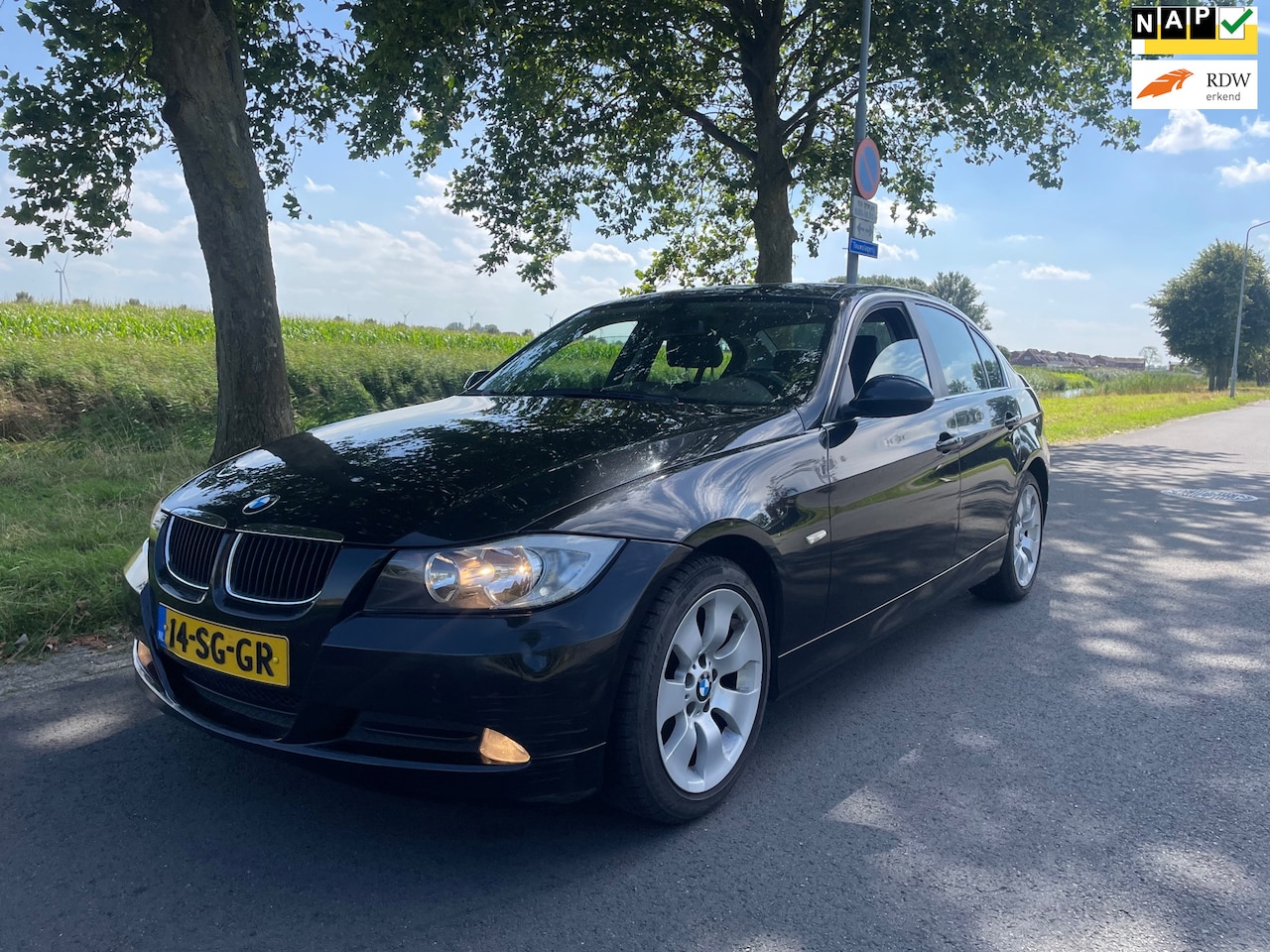 BMW 3-serie - 318i Business Line NAVI/CLIMA/CRUISE/LEDER - AutoWereld.nl