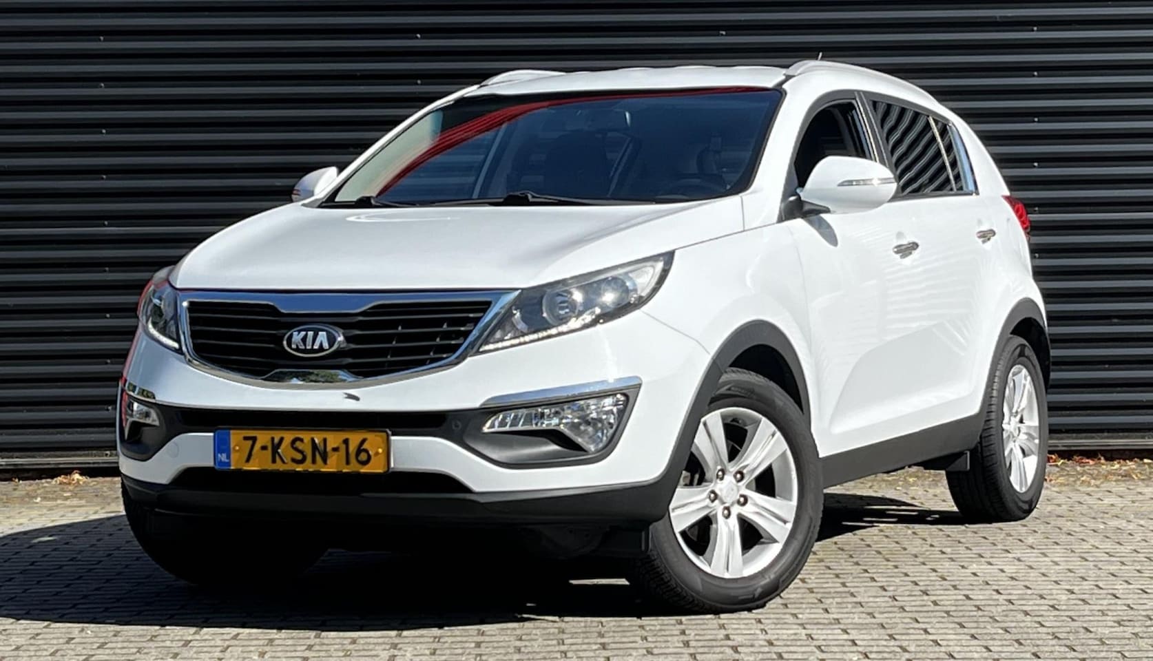 Kia Sportage - 1.6 GDI 20th Anniversary | Navigatie | Airconditioning | Lederen bekleding | 17'' Licht me - AutoWereld.nl