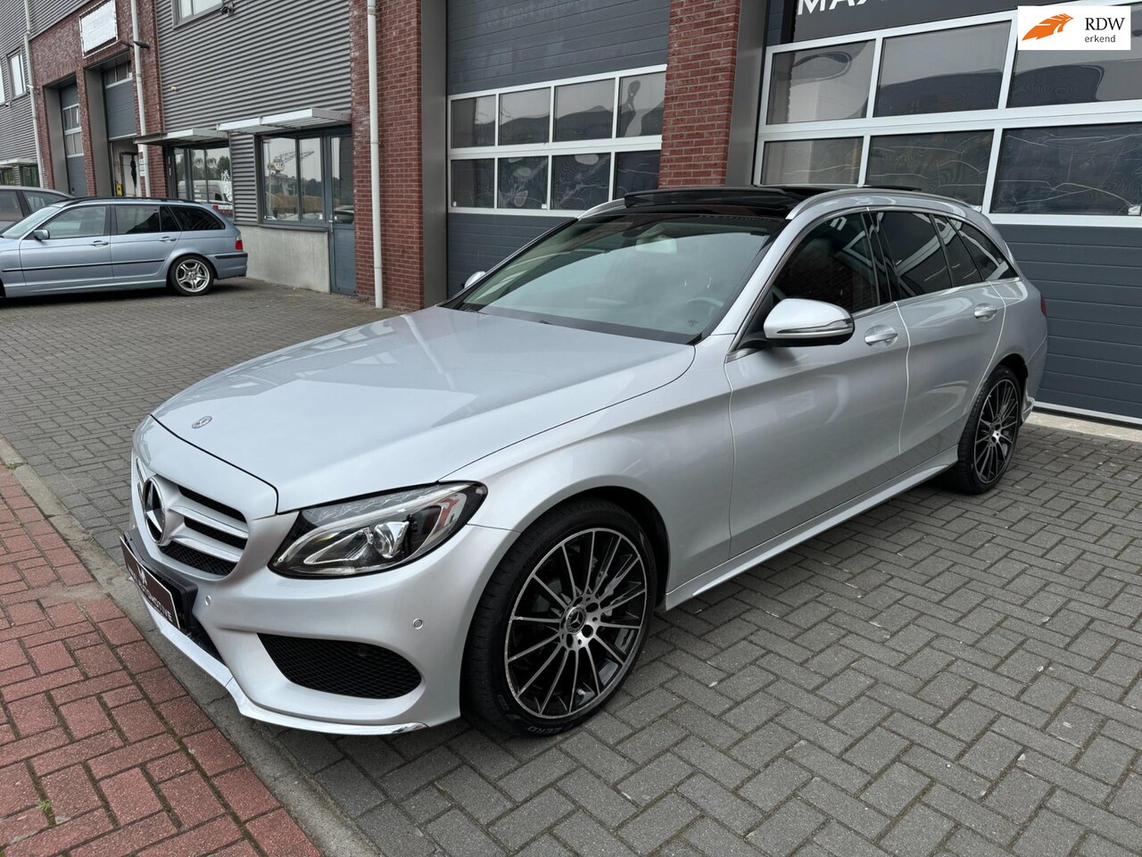 Mercedes-Benz C-klasse Estate - 180 AUT AMG LED Pano Leder PDC - AutoWereld.nl