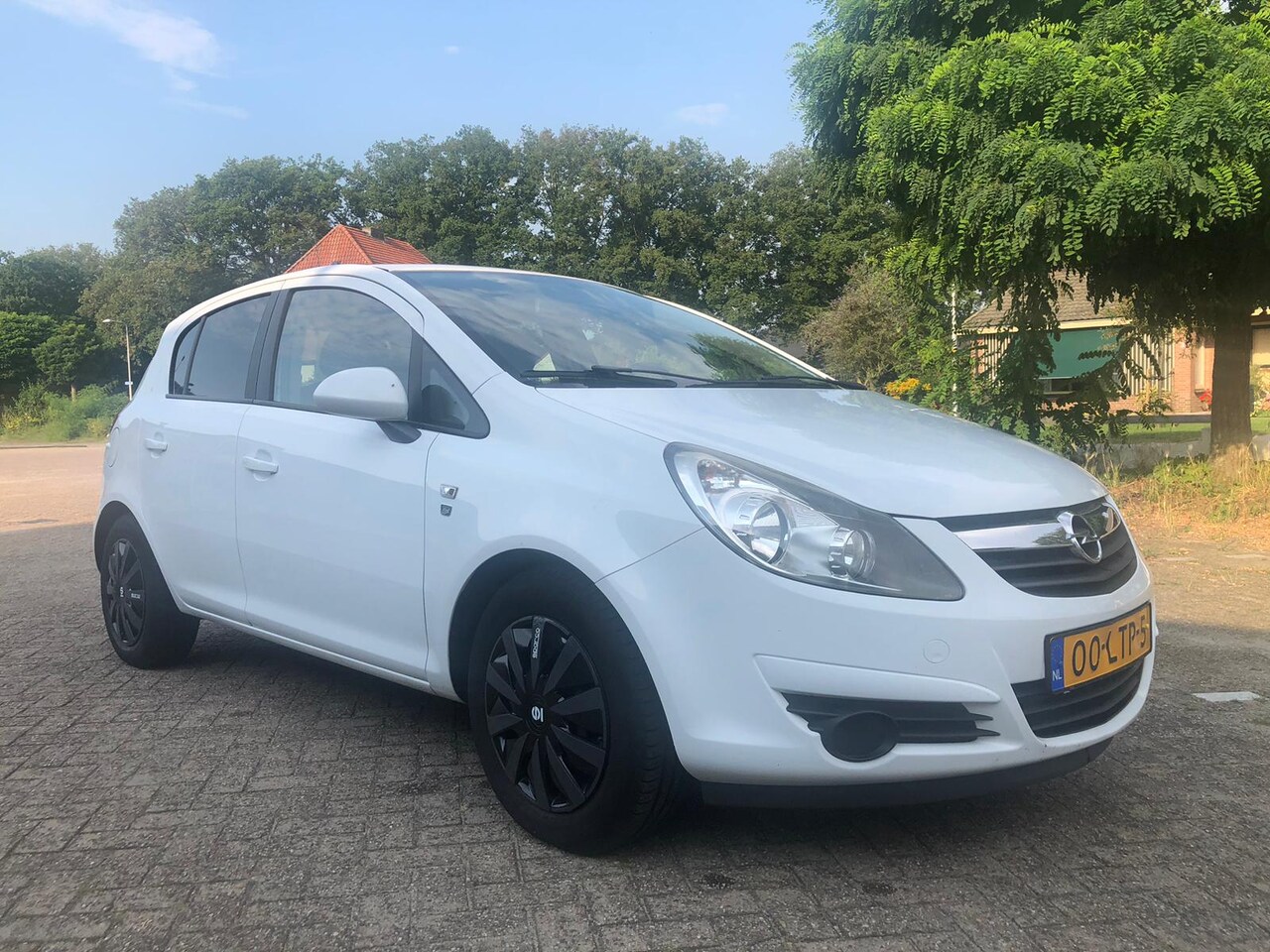 Opel Corsa - 1.0-12V '111' Edition - AutoWereld.nl