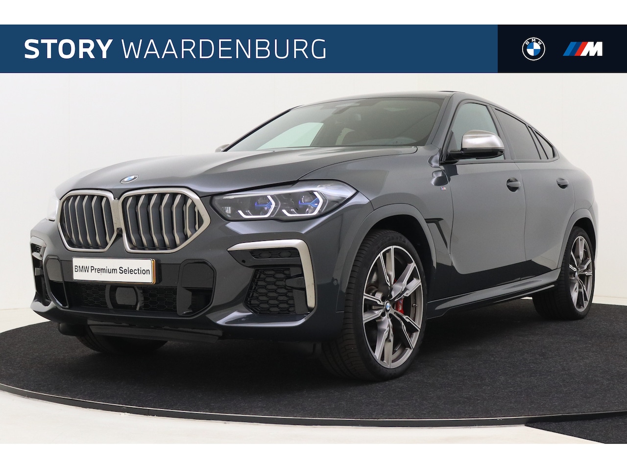 BMW X6 - M50i High Executive Automaat / Panoramadak Sky Lounge / Adaptief M Onderstel Professional - AutoWereld.nl