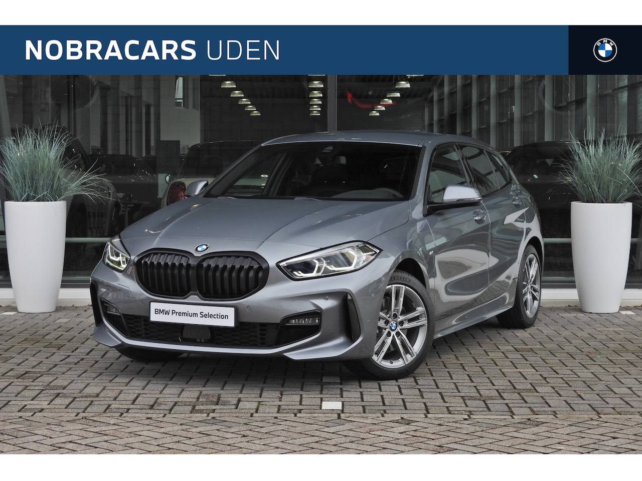 BMW 1-serie - 118i High Executive M Sport Automaat / Sportstoelen / Parking Assistant / LED / M Sportond - AutoWereld.nl