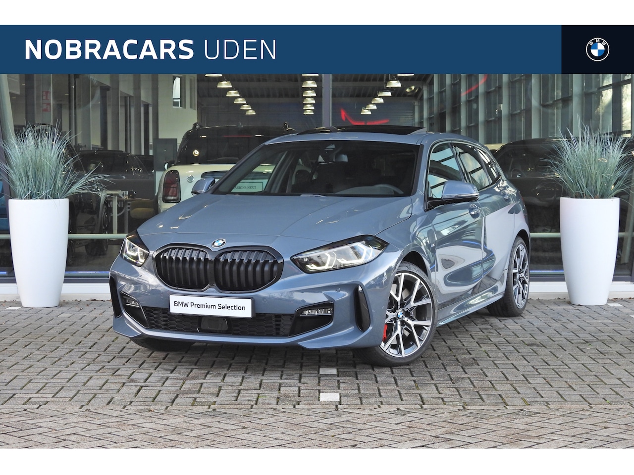 BMW 1-serie - 118i High Executive M Sport Automaat / Panoramadak / Adaptieve LED / Active Cruise Control - AutoWereld.nl