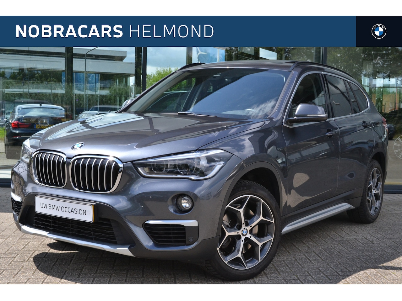 BMW X1 - sDrive20i High Executive xLine Automaat / Panoramadak / Trekhaak / Sportstoelen / Head-Up - AutoWereld.nl