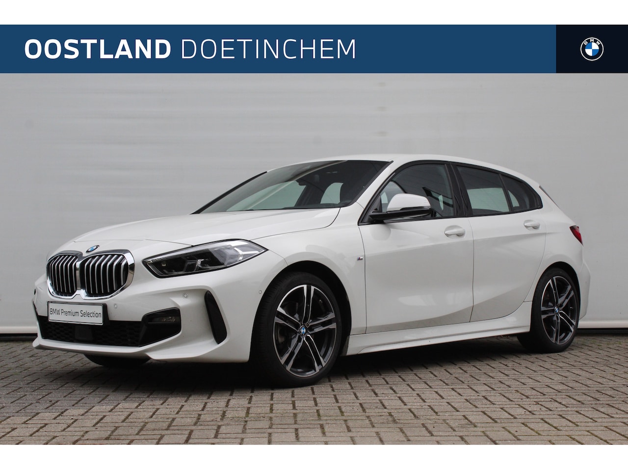 BMW 1-serie - 118i High Executive M Sport Automaat / Sportstoelen / Stoelverwarming / Adaptieve LED / Ha - AutoWereld.nl