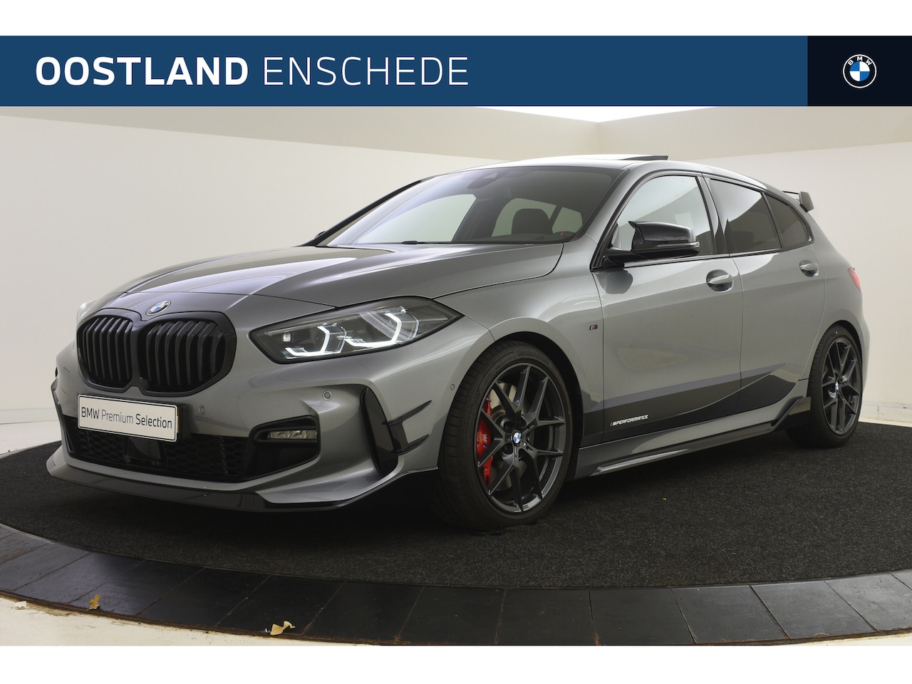 BMW 1-serie - 118i High Executive M-Performance Sport Automaat / Panoramadak / M Sport steering / Sports - AutoWereld.nl