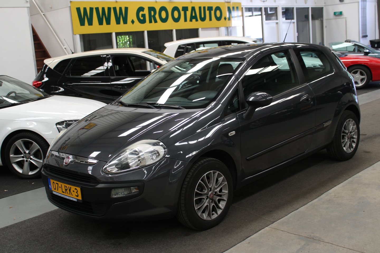 Fiat Punto Evo - 1.4 Dynamic Airco, Cruise control, Navi, Isofix - AutoWereld.nl