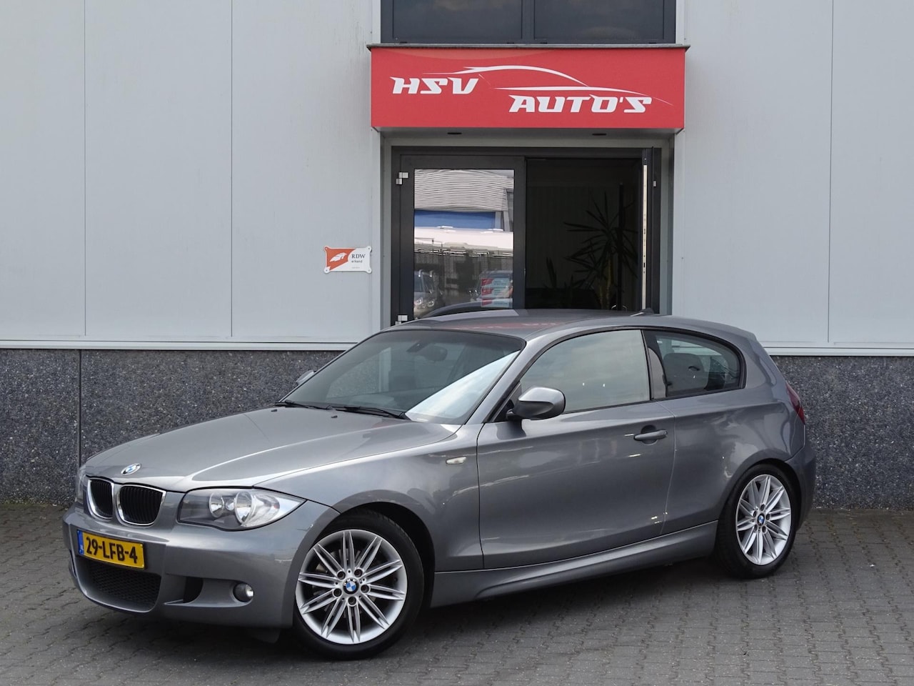 BMW 1-serie - 118i Business Line M-sport airco navi cruise org NL - AutoWereld.nl