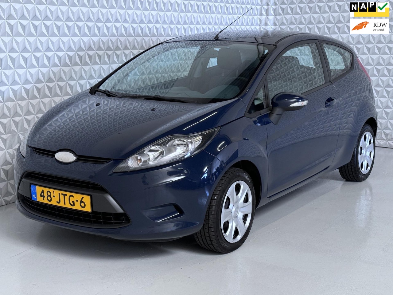 Ford Fiesta - 1.25 Limited LPG G3 Airconditioning Stuurbediening - AutoWereld.nl