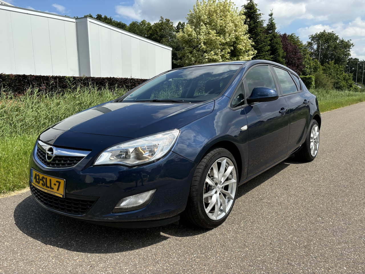 Opel Astra - 1.4 Turbo Edition / AIRCO / NAVI / CRUISE - AutoWereld.nl