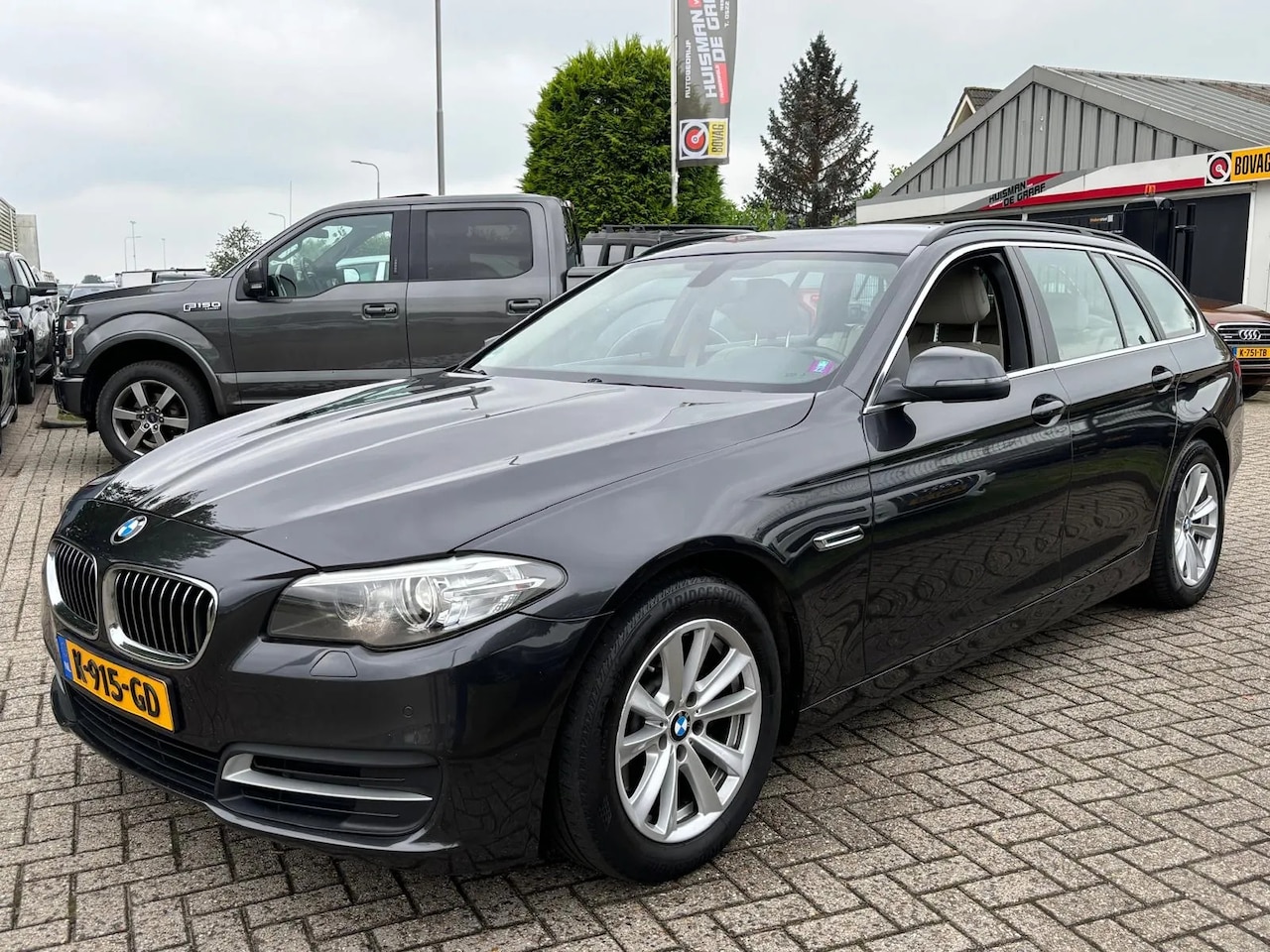 BMW 5-serie Touring - 520D 2016 Handgeschakeld Xenon Sportstoelen - AutoWereld.nl