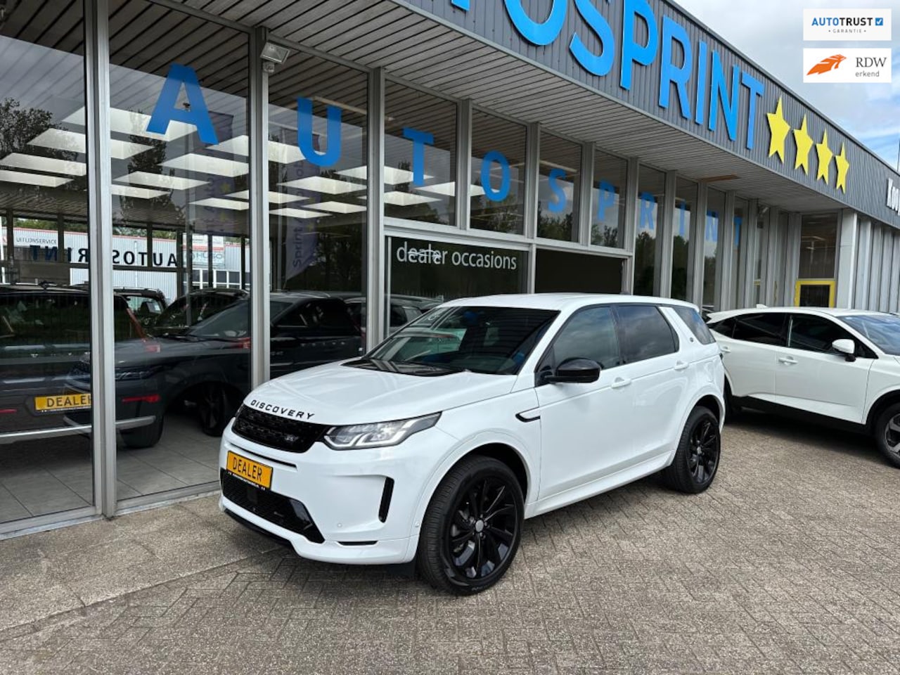 Land Rover Discovery Sport - P300e 1.5 R-Dynamic S 309PK / ELEKTRISCHE ACHTERKLEP / NAVIGATIE - AutoWereld.nl