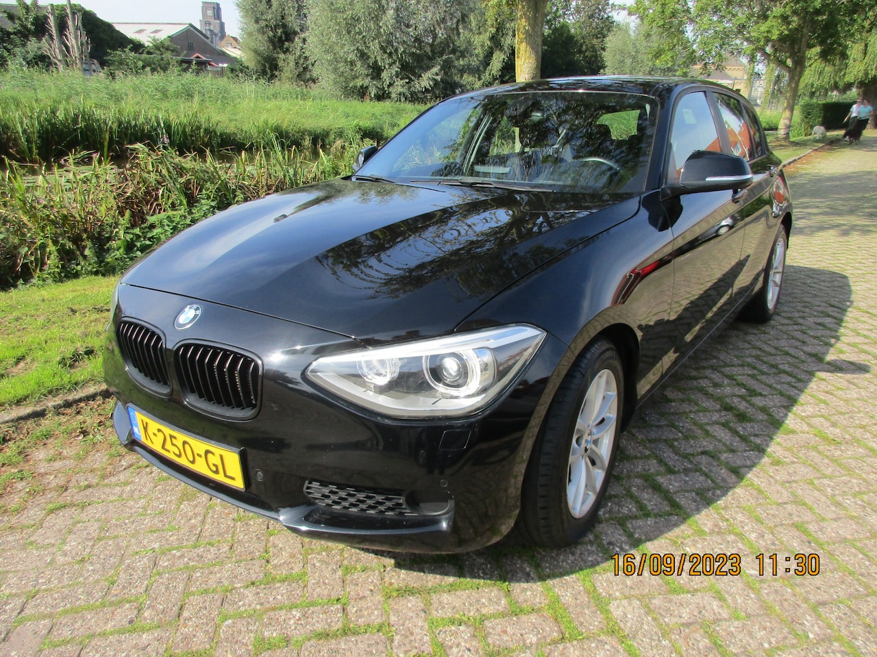 BMW 1-serie - Bmw 116i 136PK 5D Business + - AutoWereld.nl