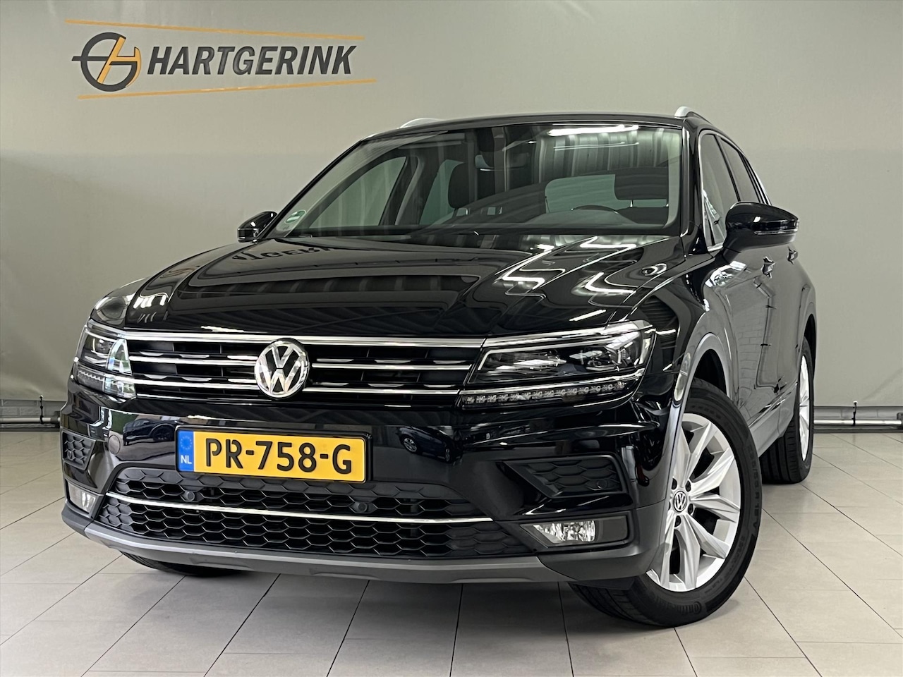 Volkswagen Tiguan - 1.4 TSI ACT 150pk DSG Highline - AutoWereld.nl