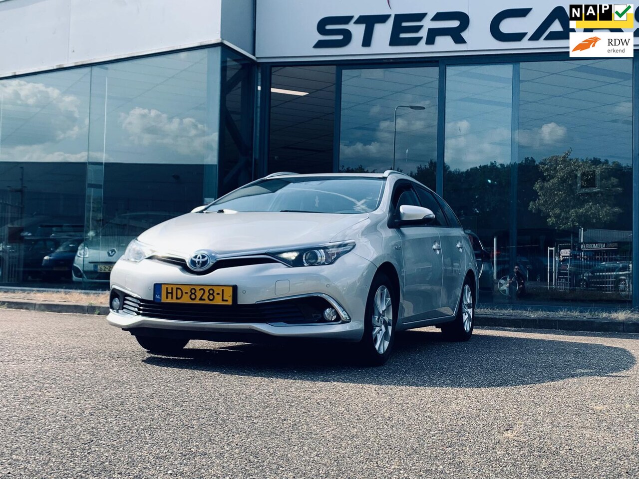 Toyota Auris Touring Sports - 1.8 Hybrid Executive 1.8 Hybrid Executive, Navi, Camera, Stoelverwarming, P Sensor, Half leder - AutoWereld.nl