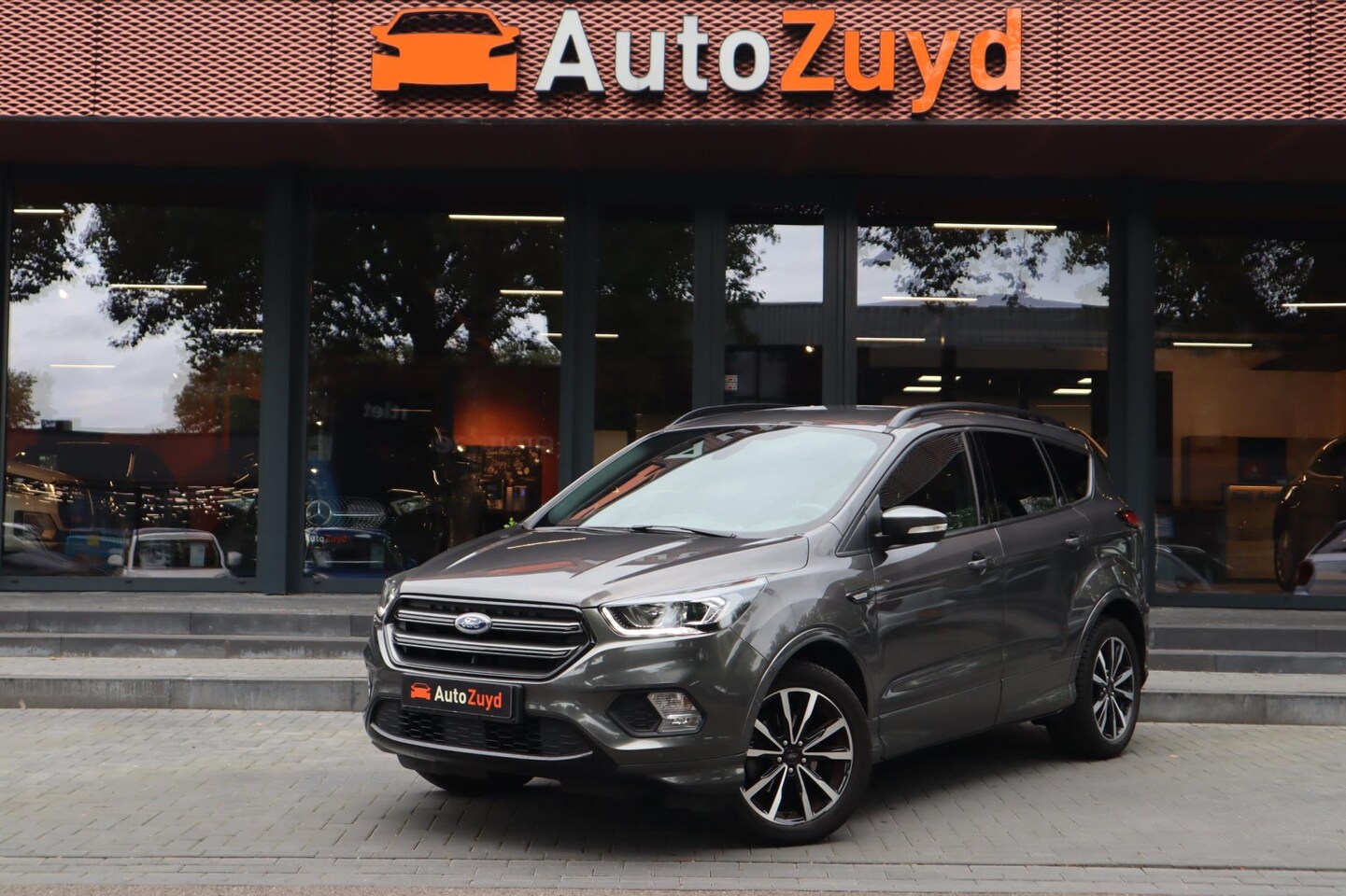 Ford Kuga - 1.5 EcoBoost ST Line / Navi / Clima / DAB - AutoWereld.nl