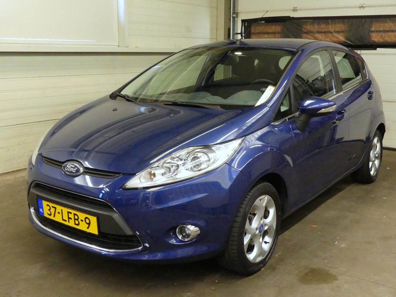 Ford Fiesta - 1.25 Titanium - Airco - 5 deurs - Netjes ondehouden - AutoWereld.nl