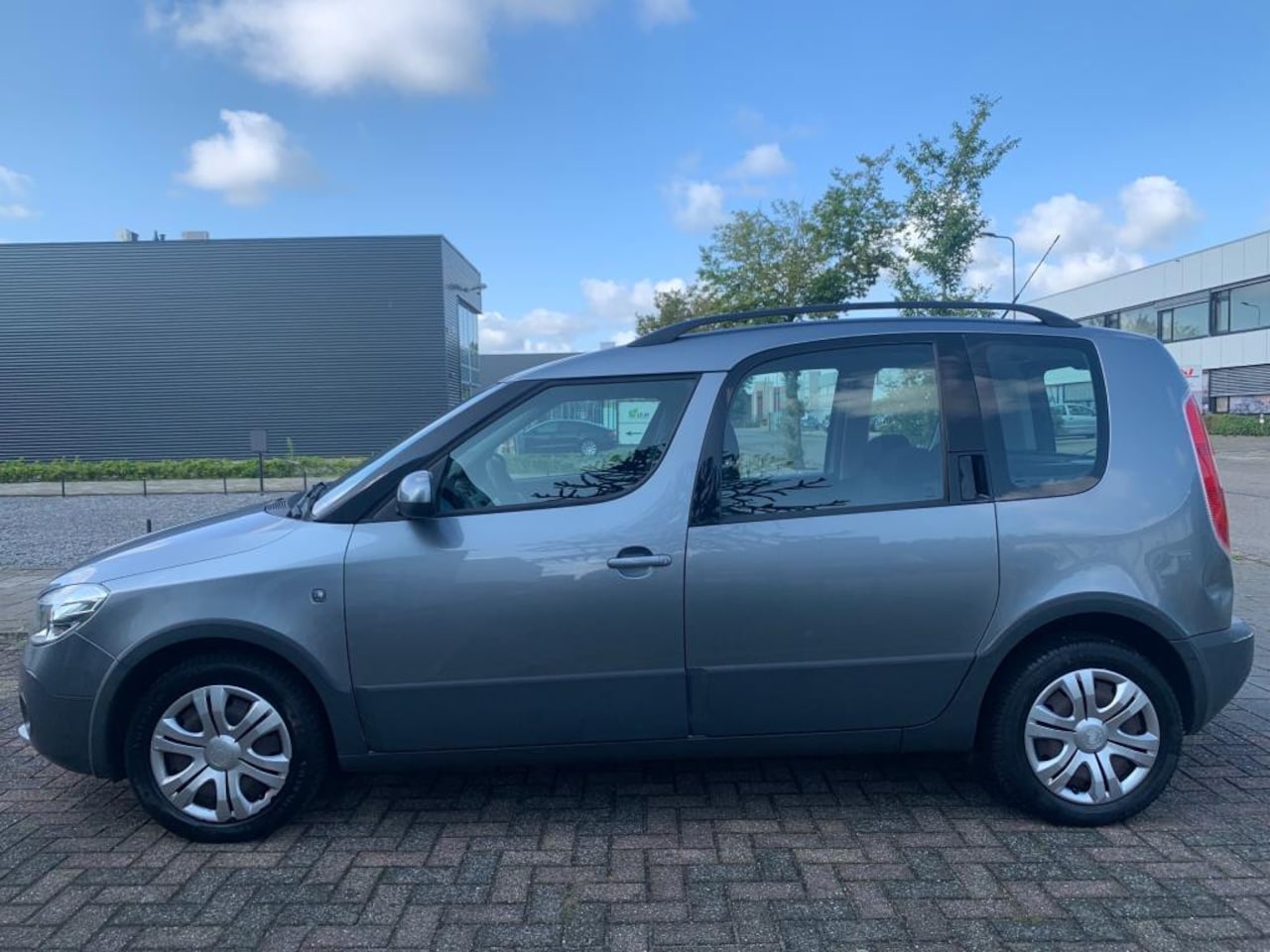 Skoda Roomster - 1.2 TSI Ambition ruime gezinsauto - AutoWereld.nl