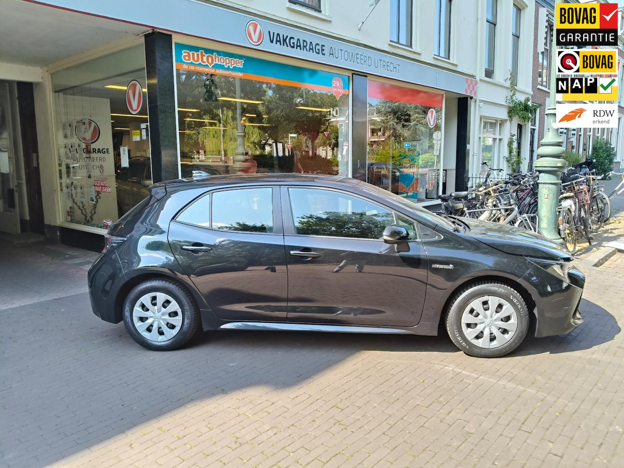 Toyota Corolla - 1.8 Hybrid Comfort 1.8 Hybrid Comfort - AutoWereld.nl