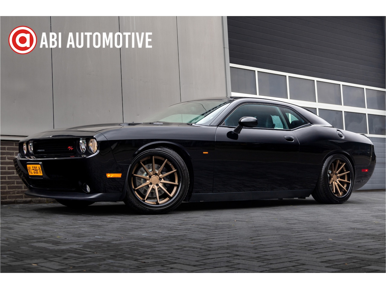 Dodge Challenger - R/T V8 381 pk / Nieuwstaat/ Ferrada-Wheels/ Sportstoelen/ Stoel.Verw/ Cruise/ Climat-Contr - AutoWereld.nl