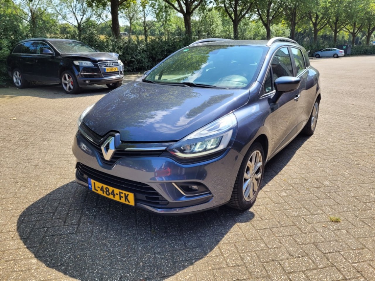 Renault Clio Estate - 1.2 TCe Intens 1.2 TCe Intens, LED verlichting, climate control, keyless entry, 6 bak, half leer, all-sea - AutoWereld.nl