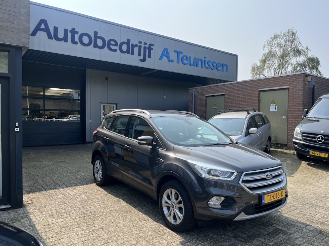 Ford Kuga - 1.5 EcoB. Titanium - AutoWereld.nl