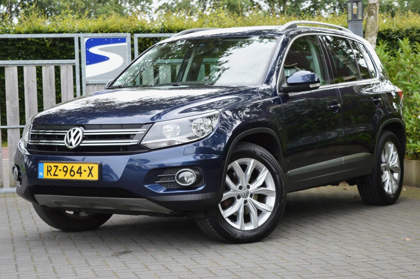 Volkswagen Tiguan - 2.0 TDI Sport&Style 4Motion DSG - AutoWereld.nl