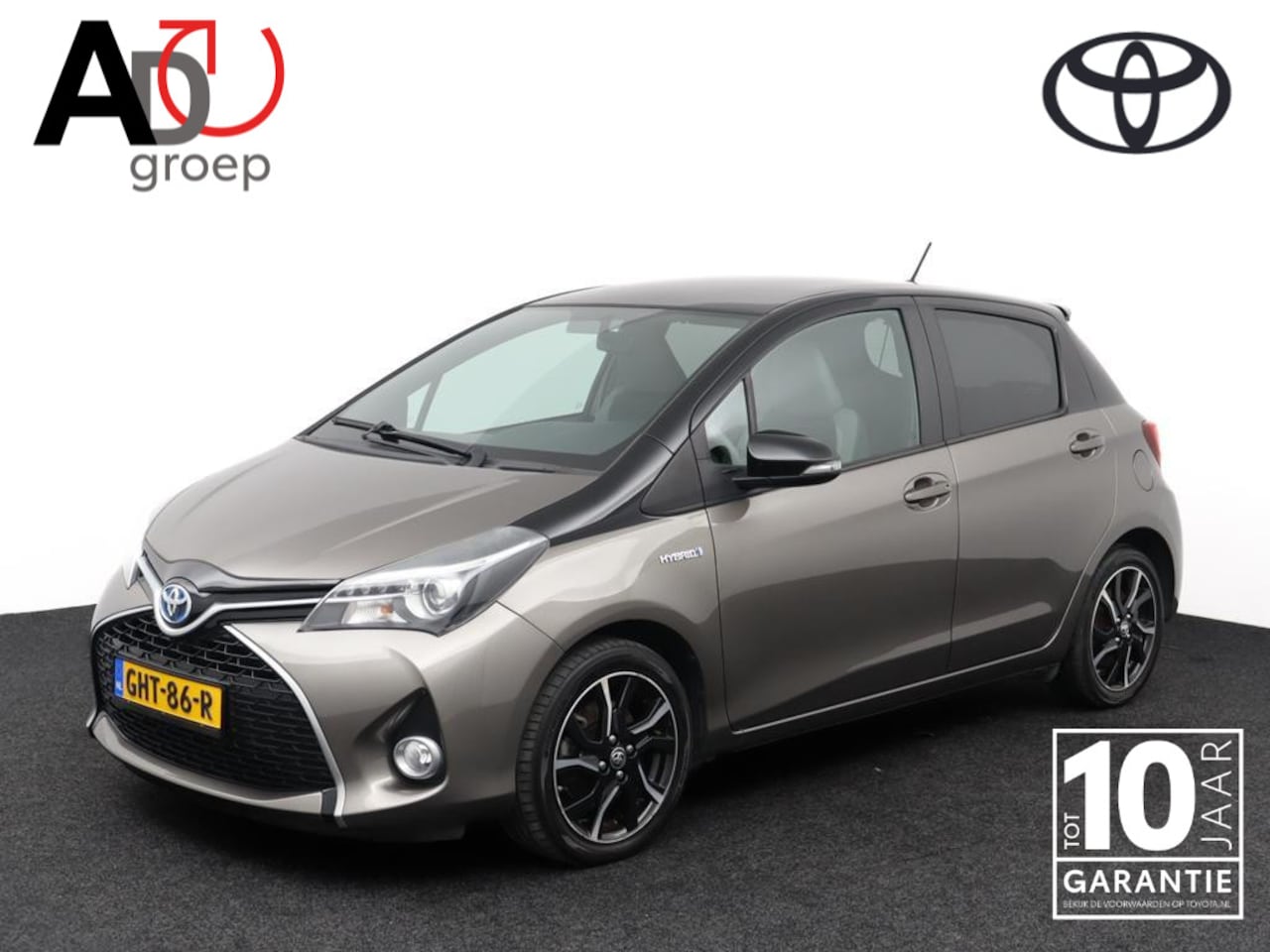 Toyota Yaris - 1.5 Hybrid Dynamic Bi-Tone | Full map navigatie | Keyless entry en start | - AutoWereld.nl