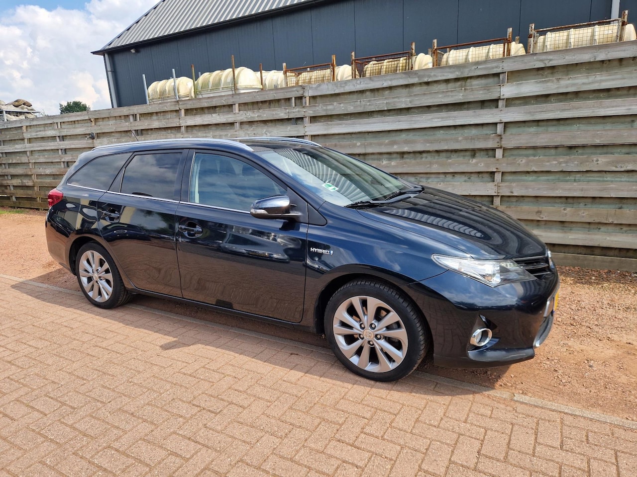 Toyota Auris Touring Sports - 1.8 Hybrid Lease Panoramadak - AutoWereld.nl