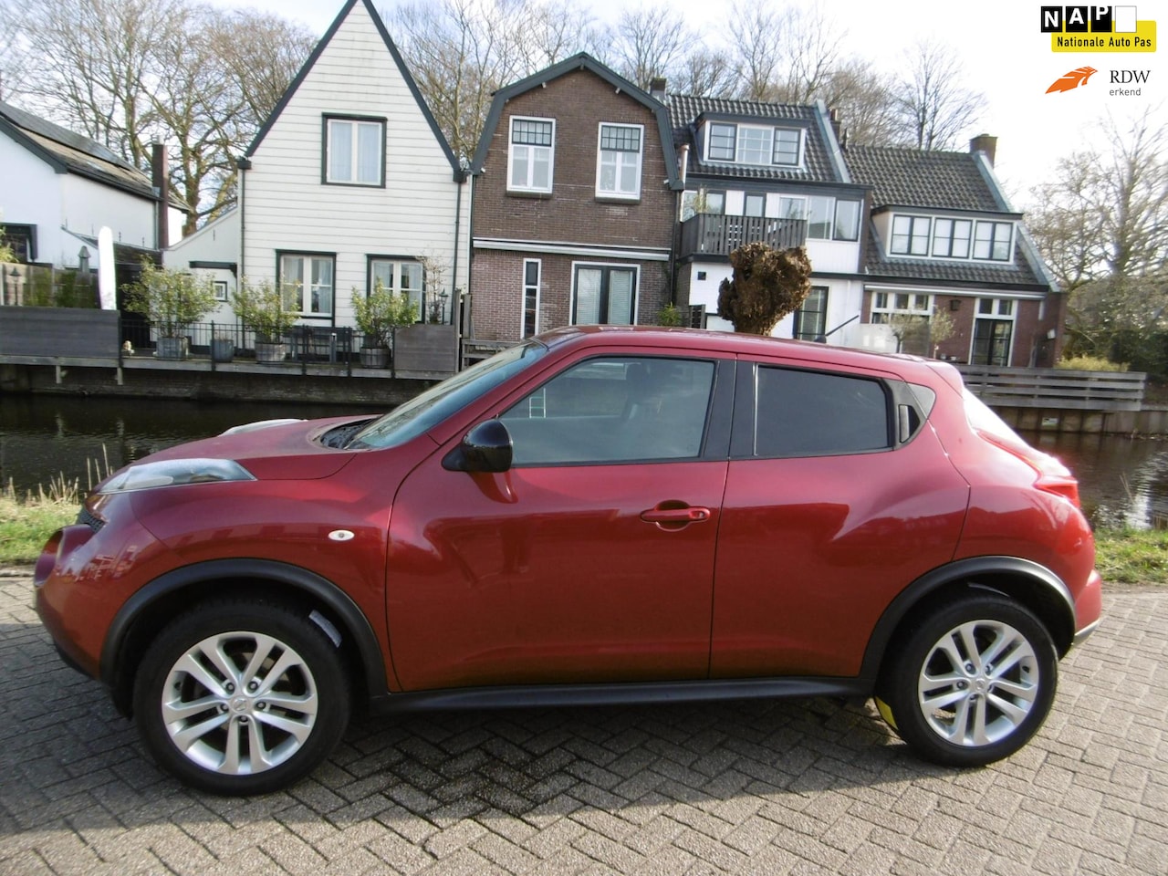 Nissan Juke - 1.6 Connect Navi Clima Trekhaak 1250kg Cruise Hoge instap - AutoWereld.nl