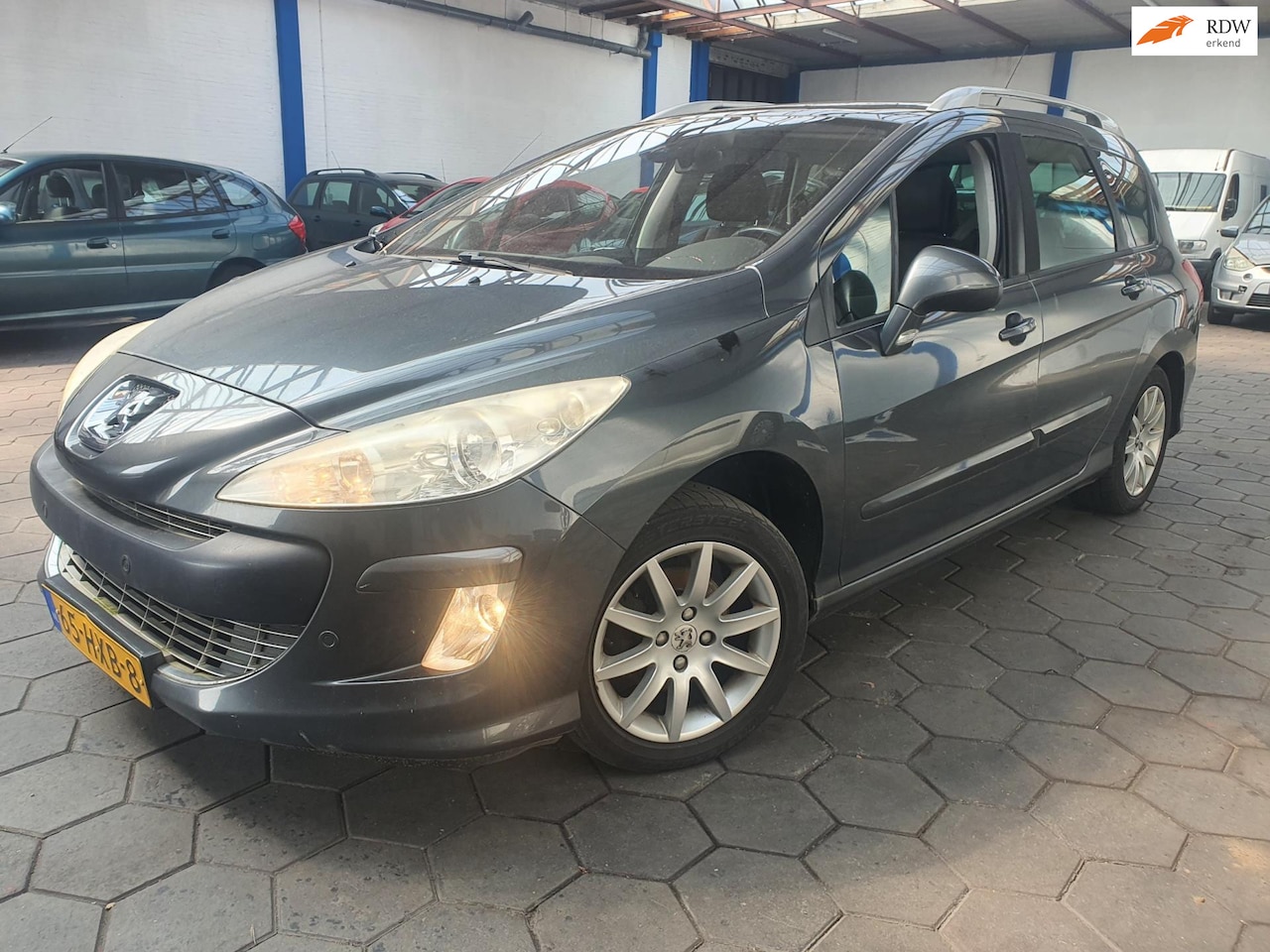 Peugeot 308 SW - 1.6 HDiF X-Line|PANO|7-P.|ECC|TURBO DEFECT - AutoWereld.nl